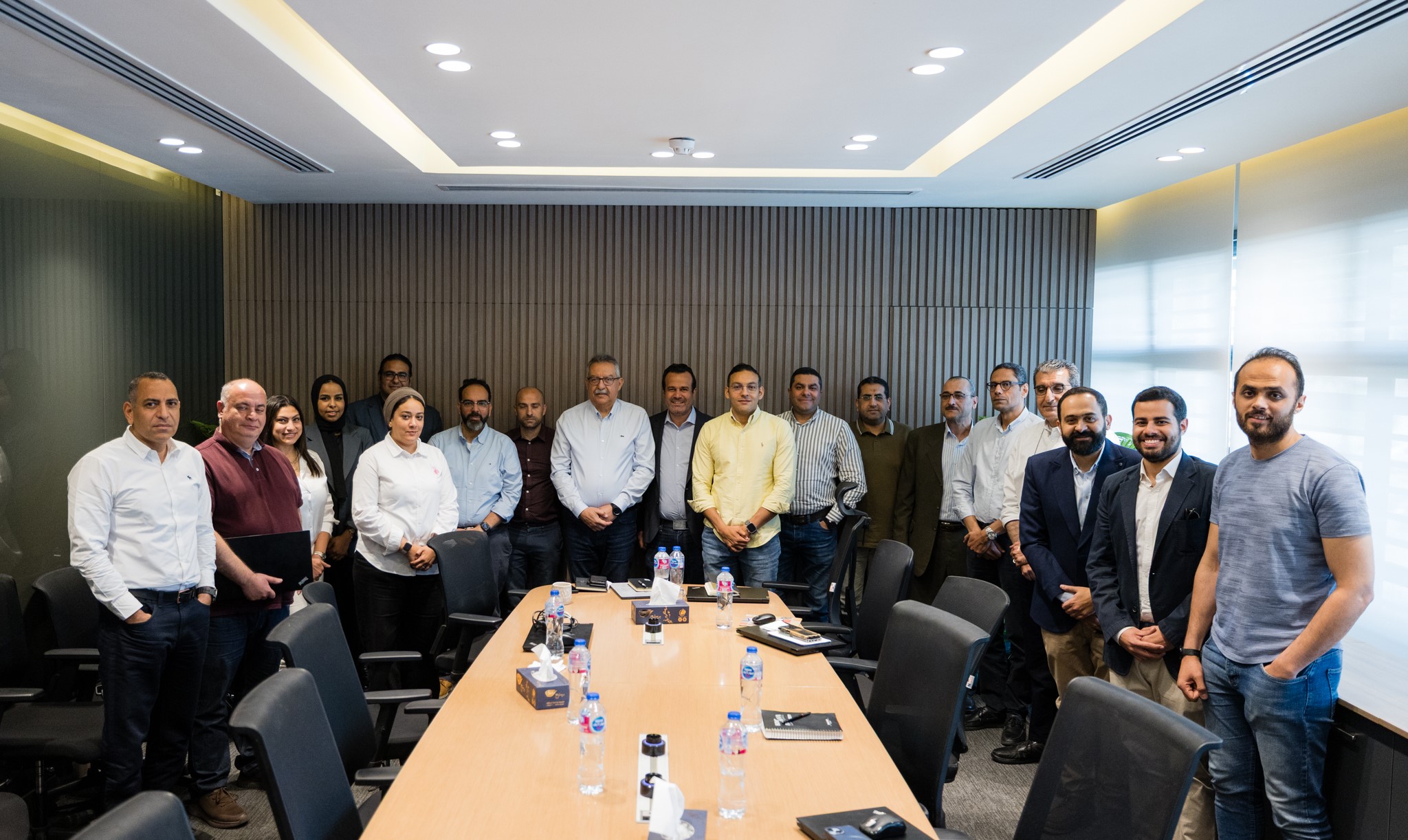Atrium team gathered in the meeting room